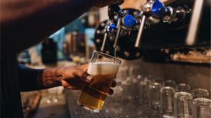 Beer being poured from a tap at a craft brewery near Hackettstown, New Jersey